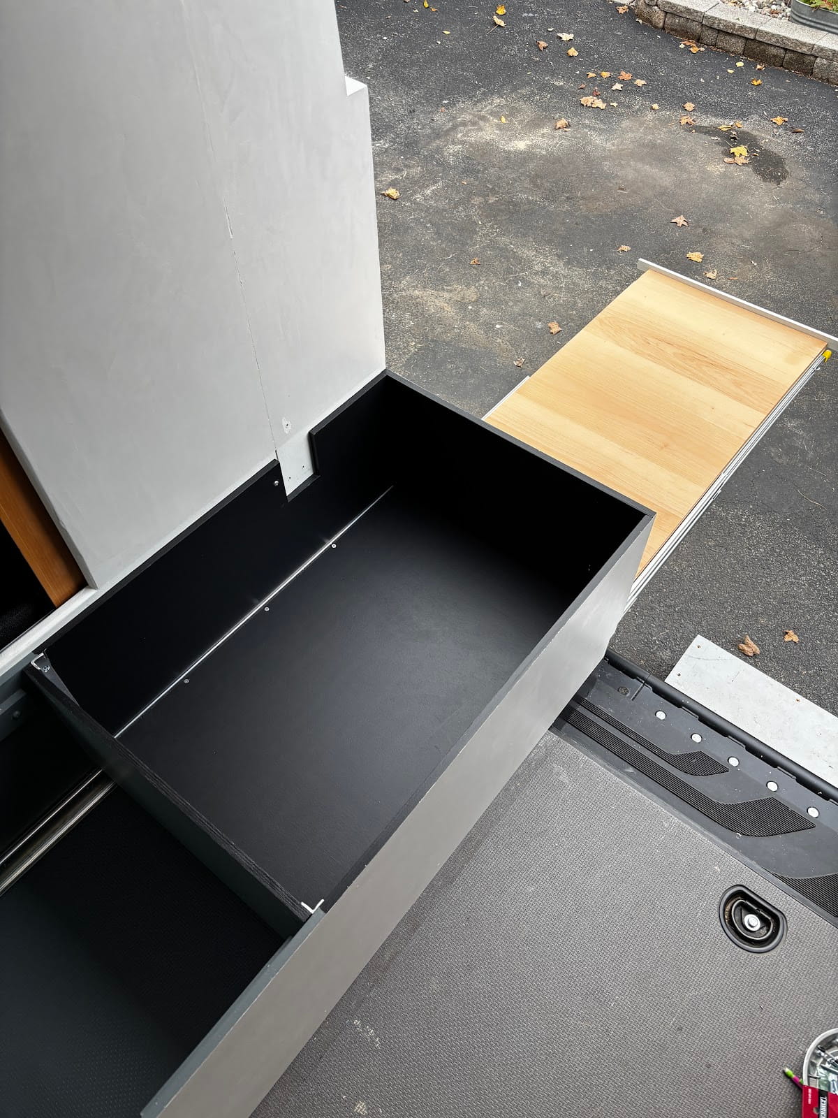 Storage boxes inside the bench